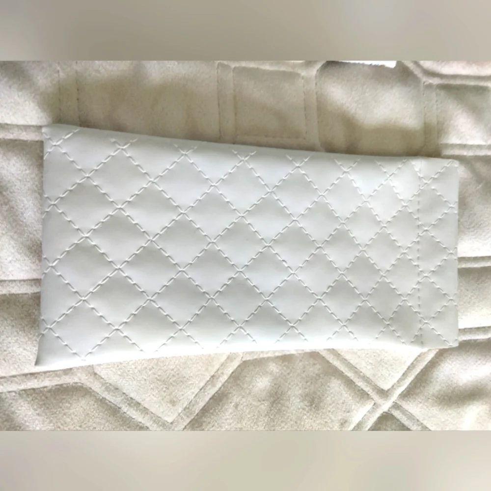 2 Sunglass cases. Snaps open and closed. Protect your glasses. White quilted